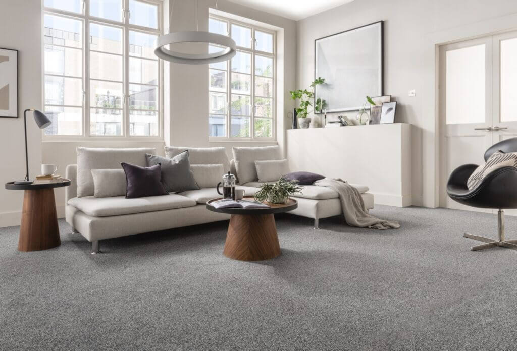 What benefits does man-made carpet have?